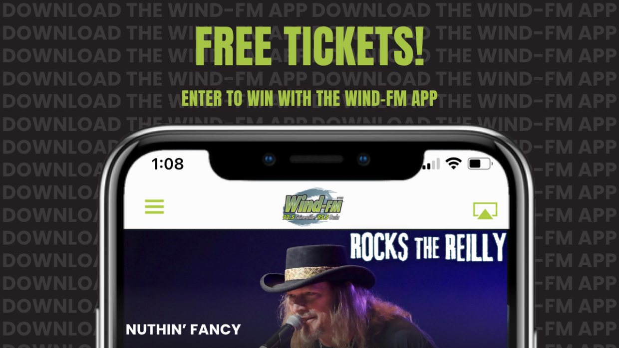 Promotional banner offering free tickets, with bright green 'FREE TICKETS!' text above a smartphone displaying the Wind-FM app.
