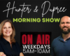 Banner for Hunter & Dupree Morning Show with a smiling woman on the left, a smiling man on the right, and an ON AIR sign in the center; text reads 'Weekdays 5AM-10AM'.